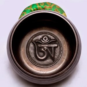 om-carving-singing-bowl-nepal-01