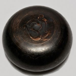 om-carving-singing-bowl-nepal-02